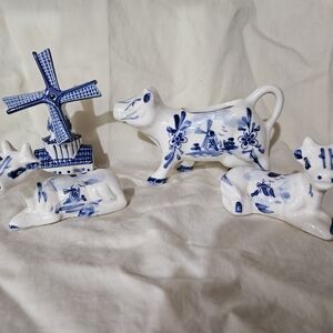 Blue and White Ceramic Cow Figurines Set